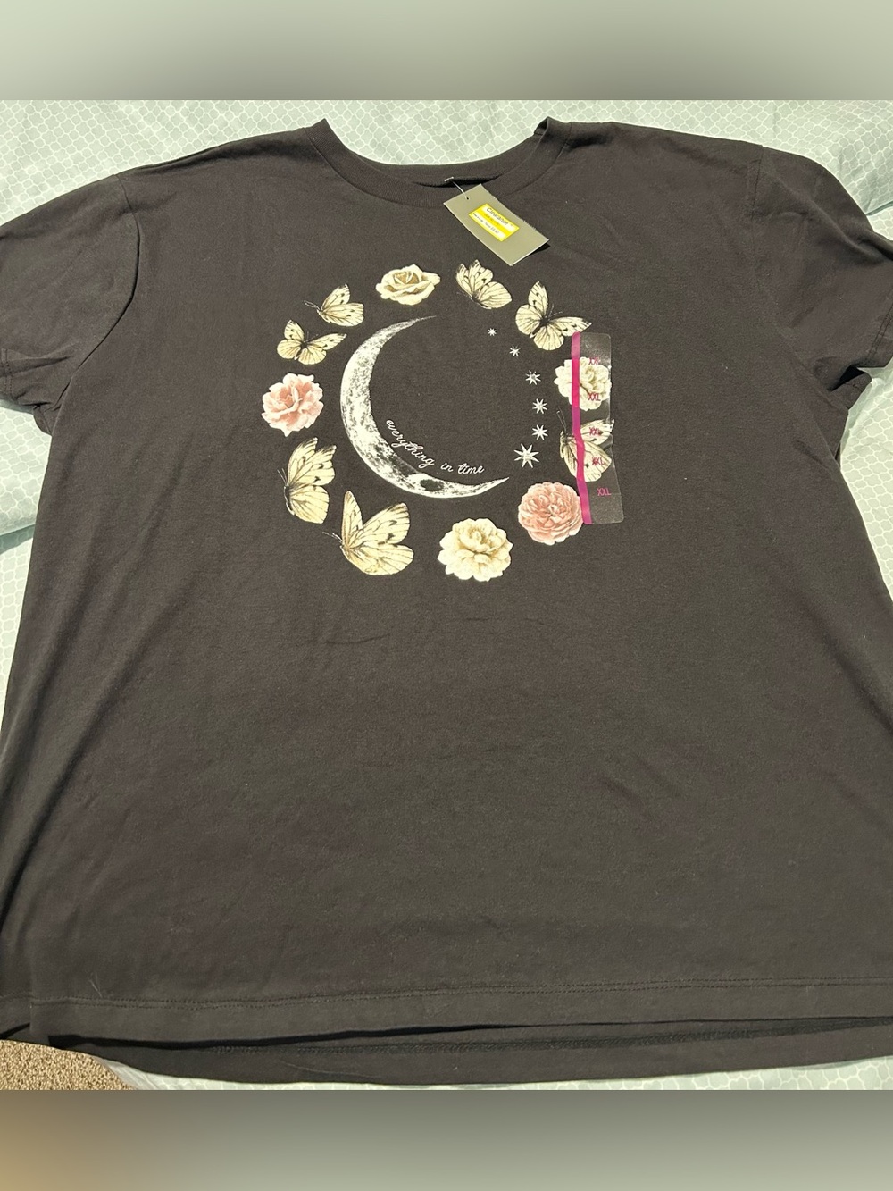 Doe brand boho tee with moon, butterflies and rose graphics